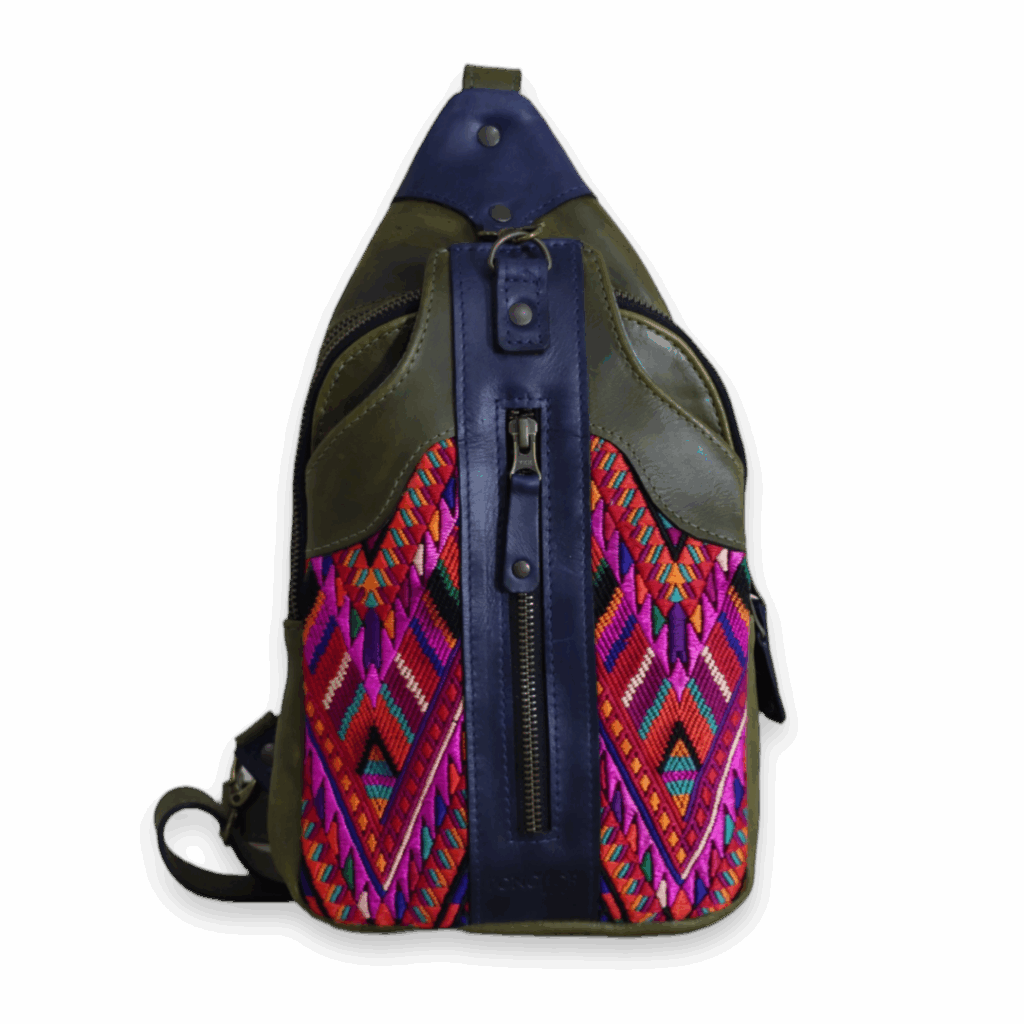 IXQUIC, a handcrafted leather crossbody, with a huipil